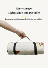 Outdoor picnic mat is a hand-held luggage protection and moisture-proof camping blanket, suitable for travel, beach and trips.